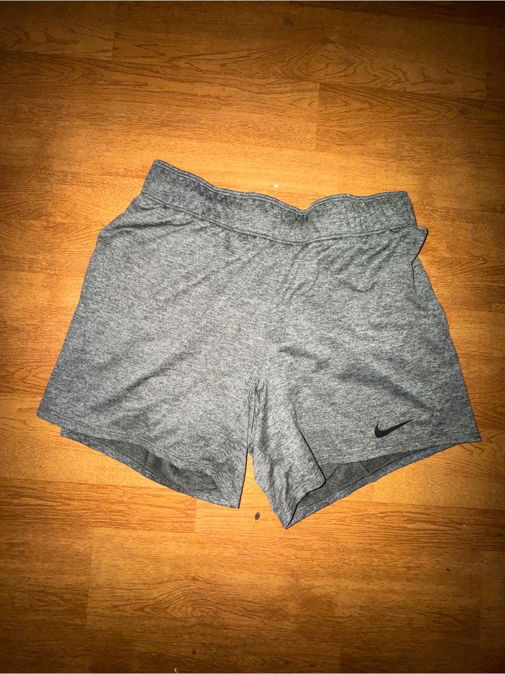 Nike Women's Light Gray Athletic Shorts with Swoosh